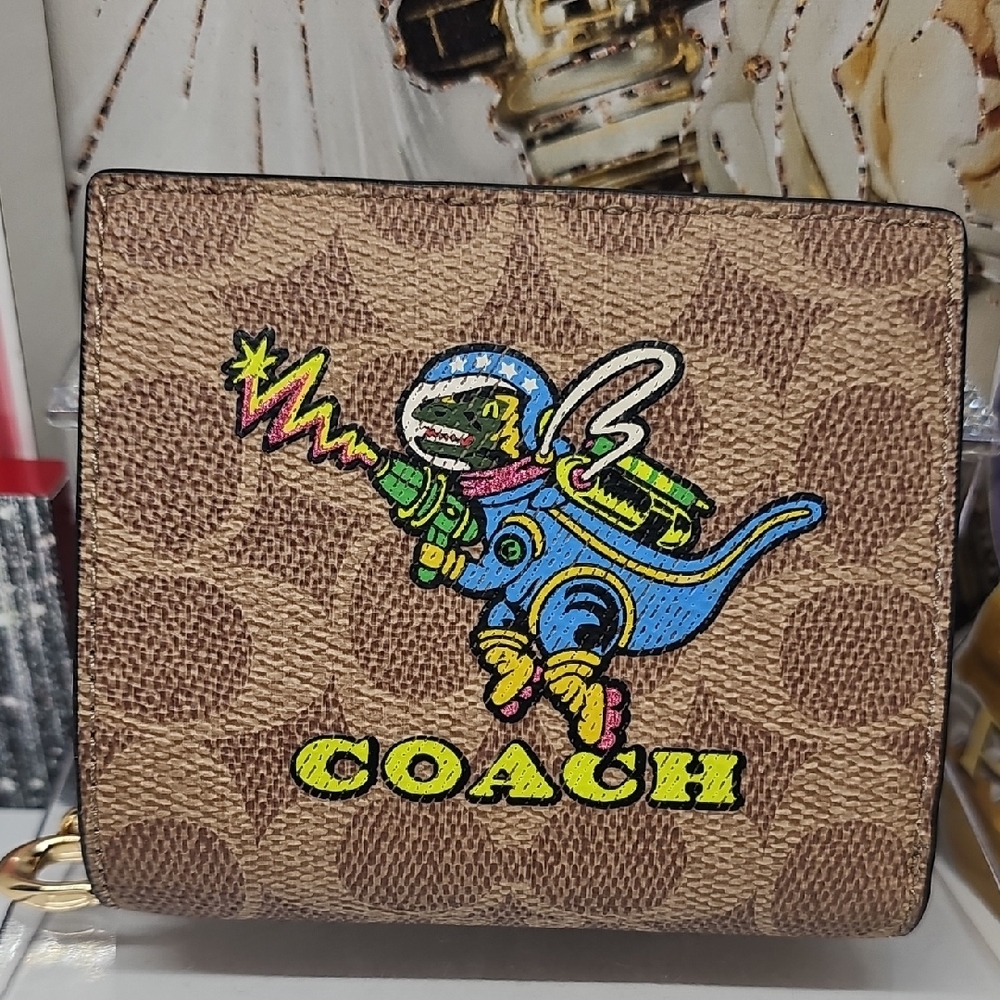 Coach Cosmic Rexy Brown Wallet with Dinosaur Design
